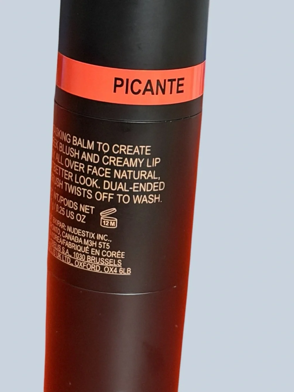 Nude Stix Multi tasking Balm in PICANTE Bright Red Orange Cream Stick